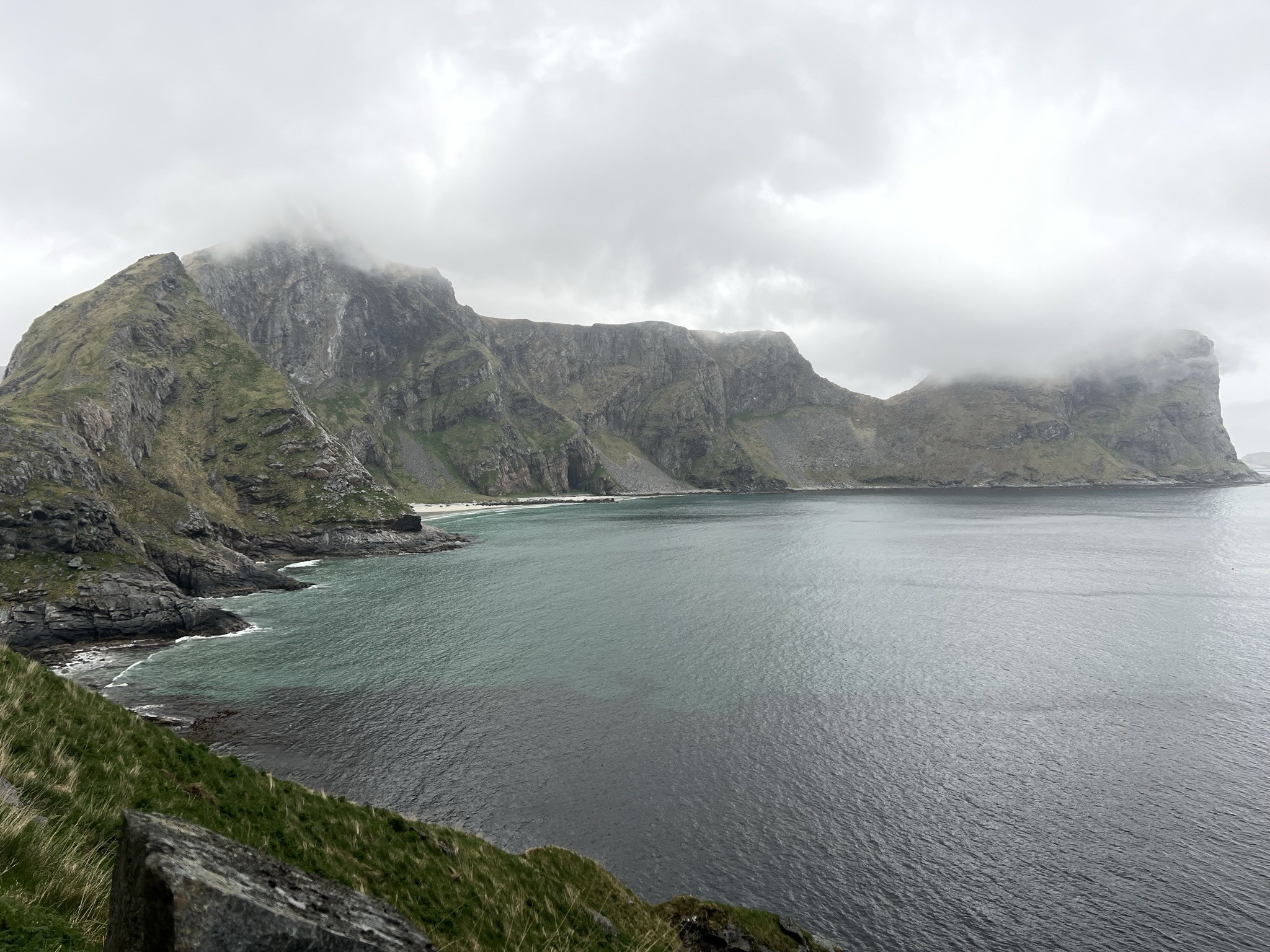 Sea cliffs plunging into the water on the Arctic Norway coast